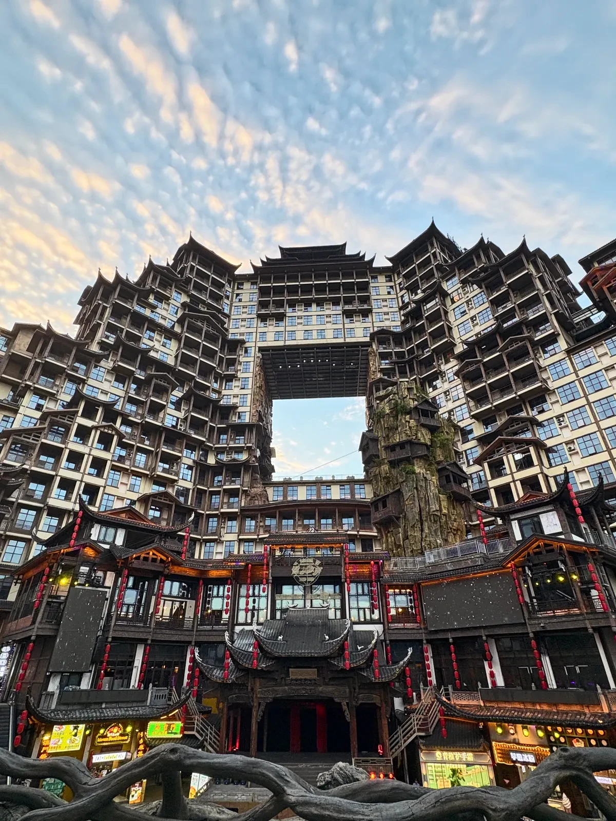 Towering timber fa&ccedil;ades of 72 Wonder Tower before sunset