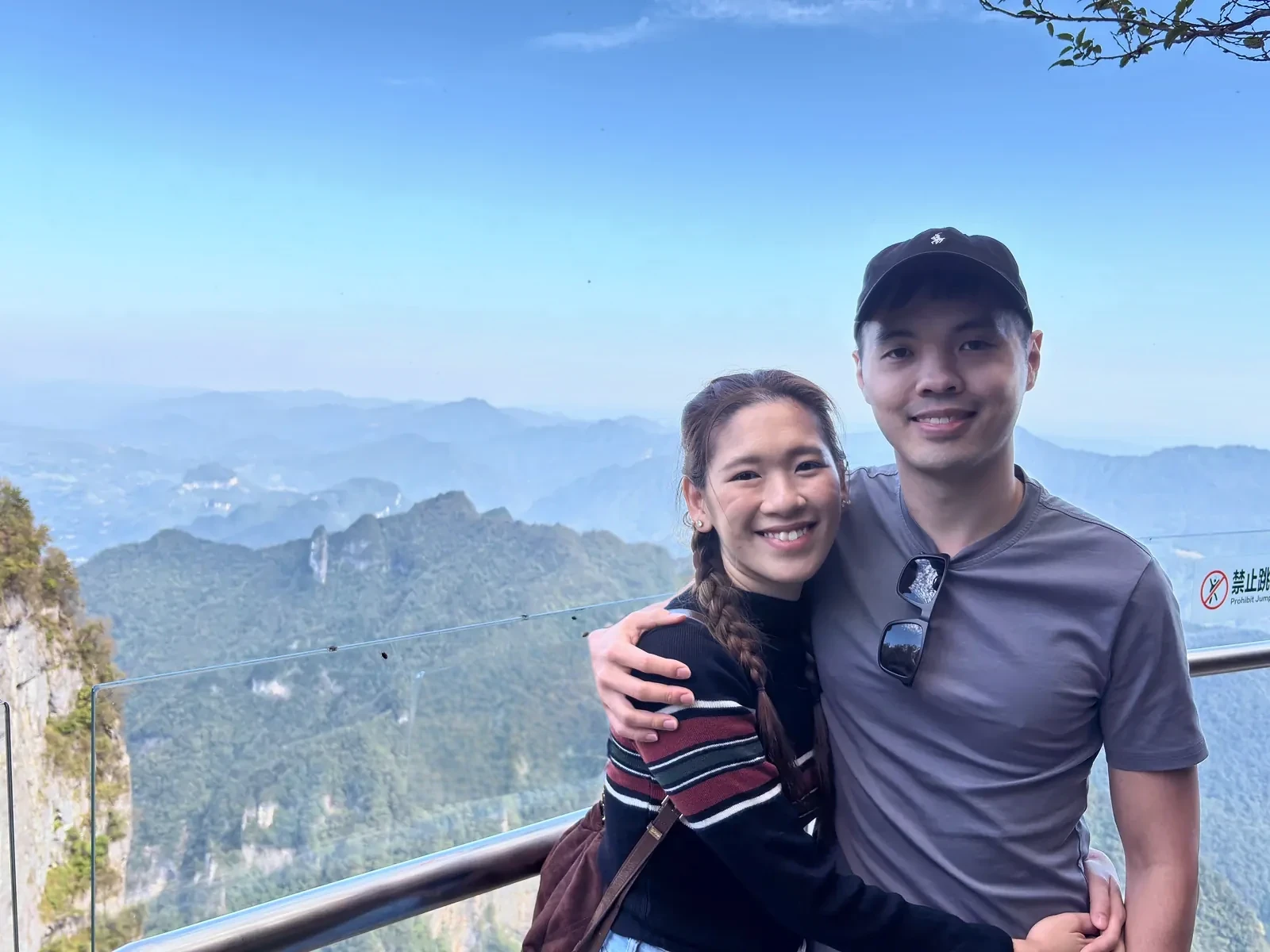 Couple together on the Tianmen Mountain skywalk