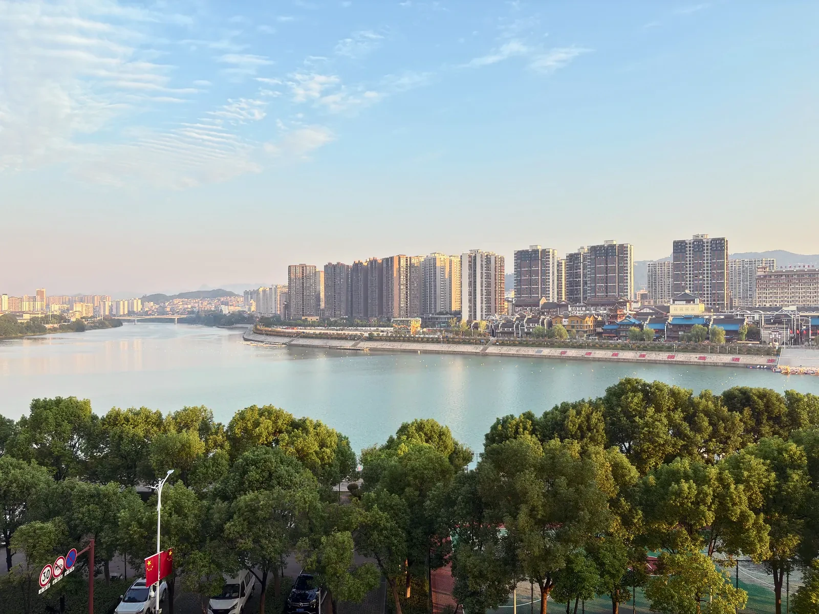 Zhangjiajie river and apartment skyline in soft morning light