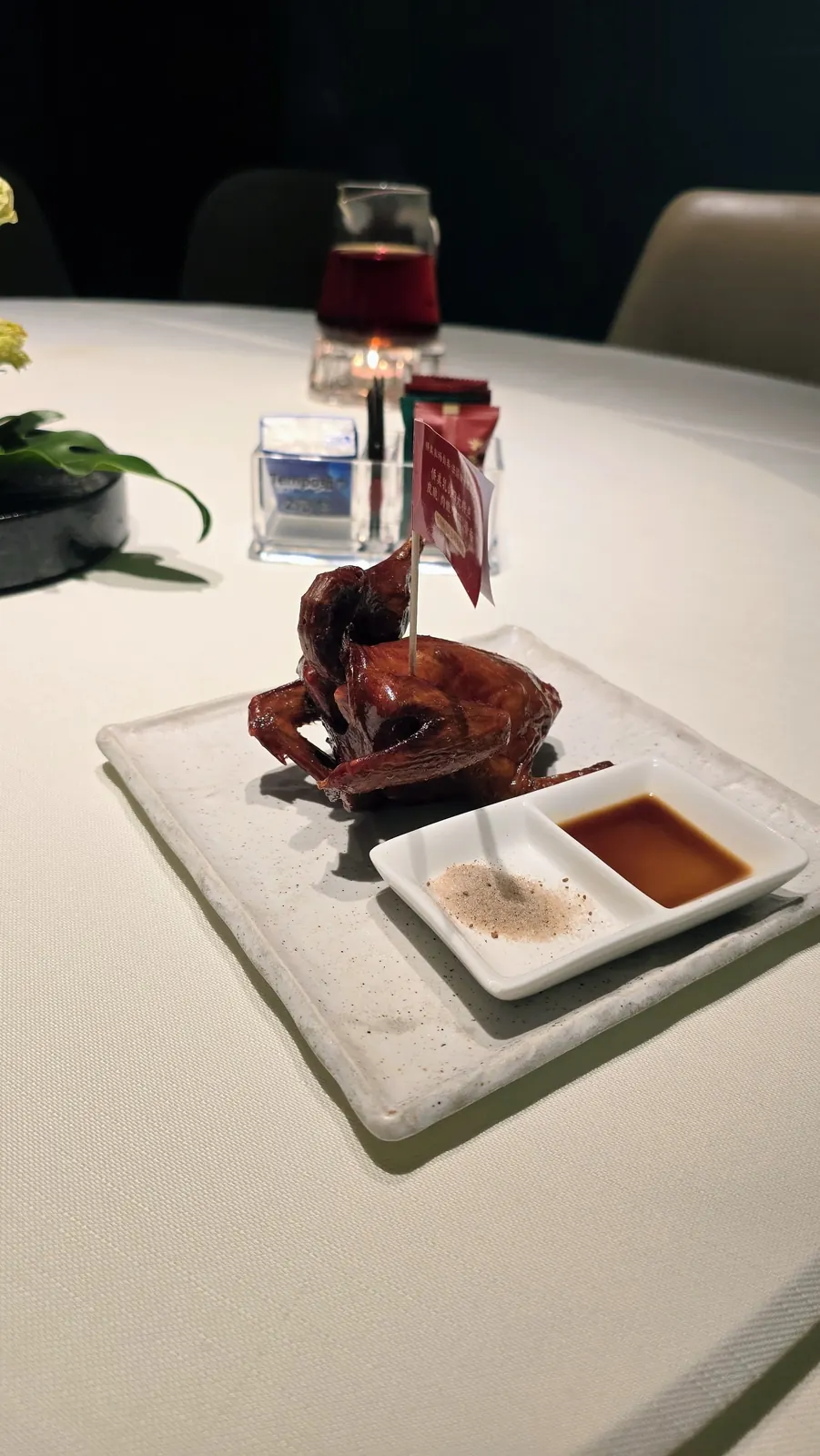 Roast pigeon served at Qiaomei Shijia