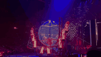 Motorcyclists performing inside a steel globe at Chimelong International Circus