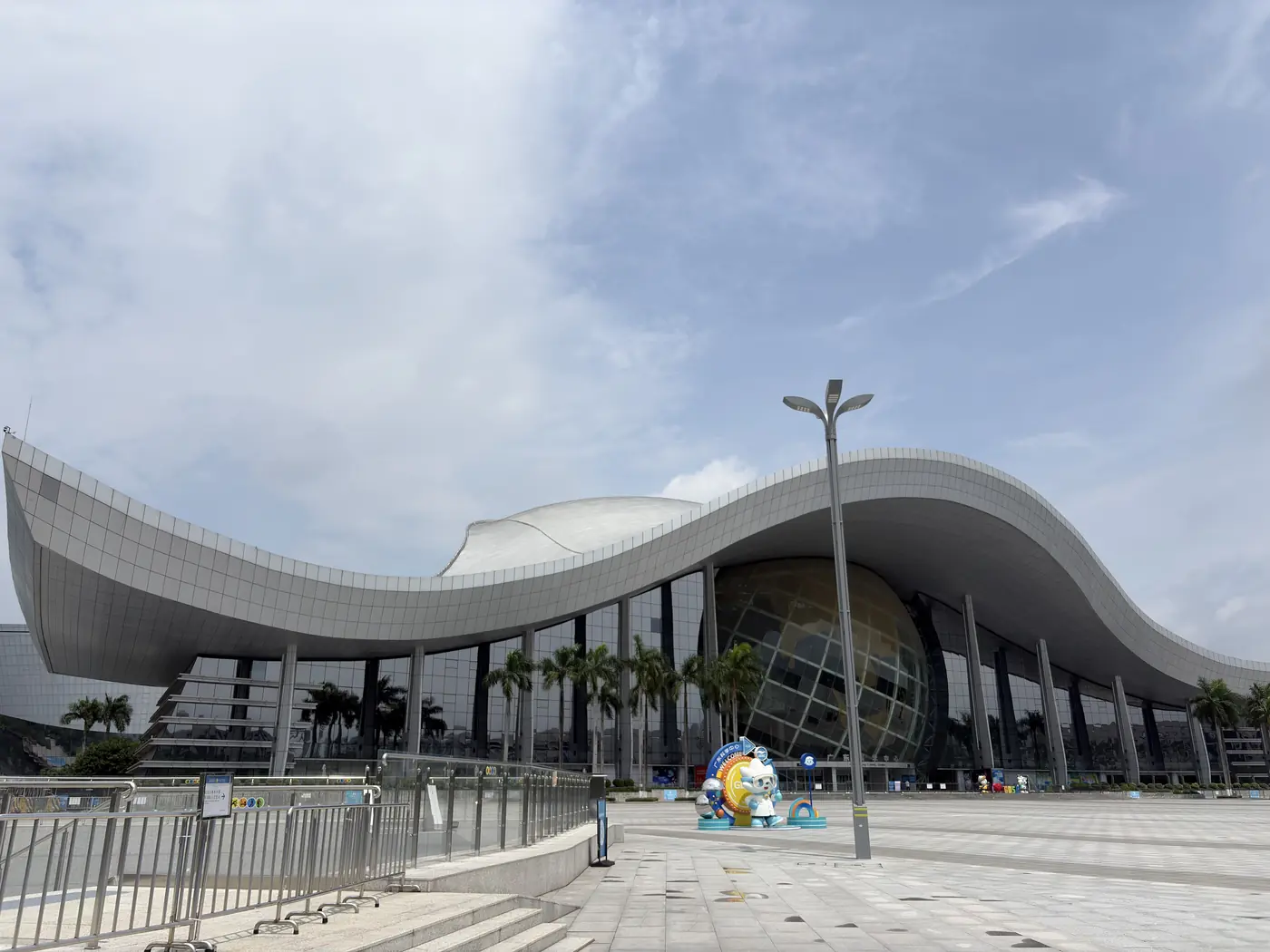 Curved silver facade of Guangdong Science Centre